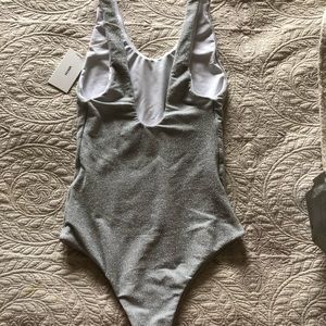 Mikoh 1 piece. Bought on sale so can’t return it. It’s too big. Tags on still